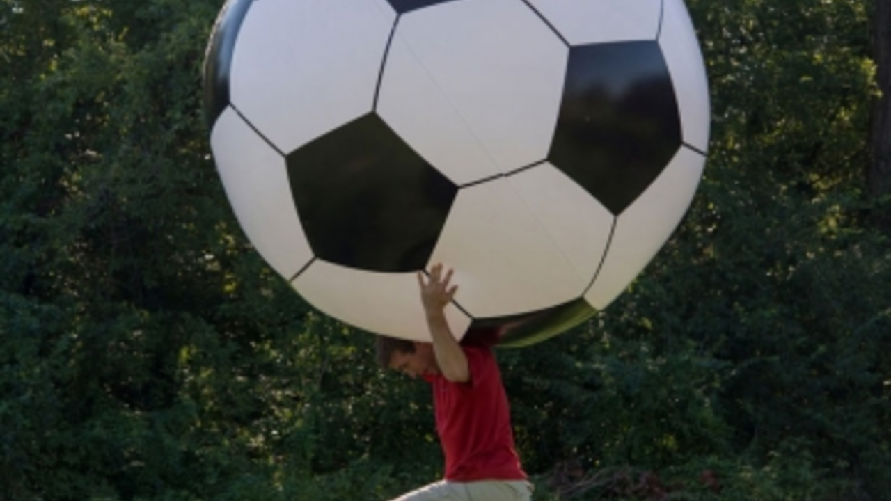 How do you stop a soccer ball from bouncing?